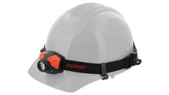 A hard hat with an LED headlamp attached to it by a set of four hard hat clips. 